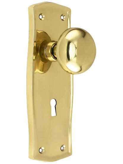 Prairie Design Mortise Lock Set With Round Brass Knobs in Polished Brass.